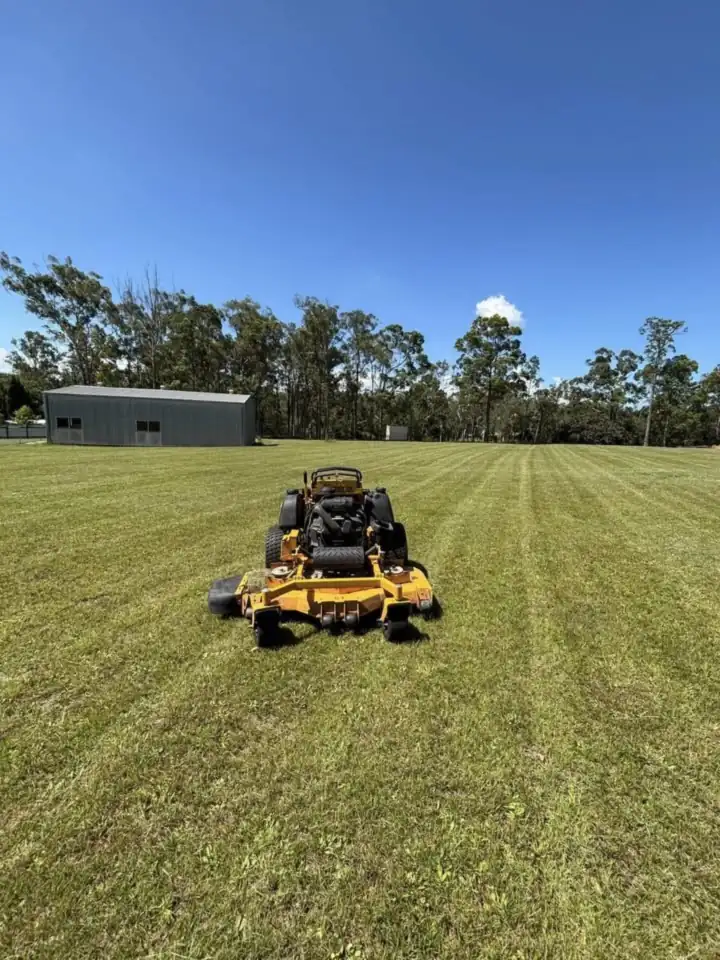 Rural property in the Somerset region with mown lawn and garden beds
